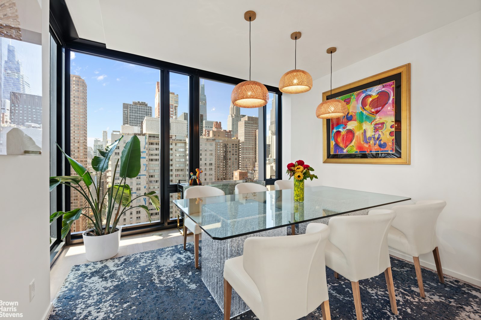 695 1st Avenue, Unit 28E Manhattan, NY 10016 - Photo 2 of 15 a view of a dining room with furniture window and wooden floor