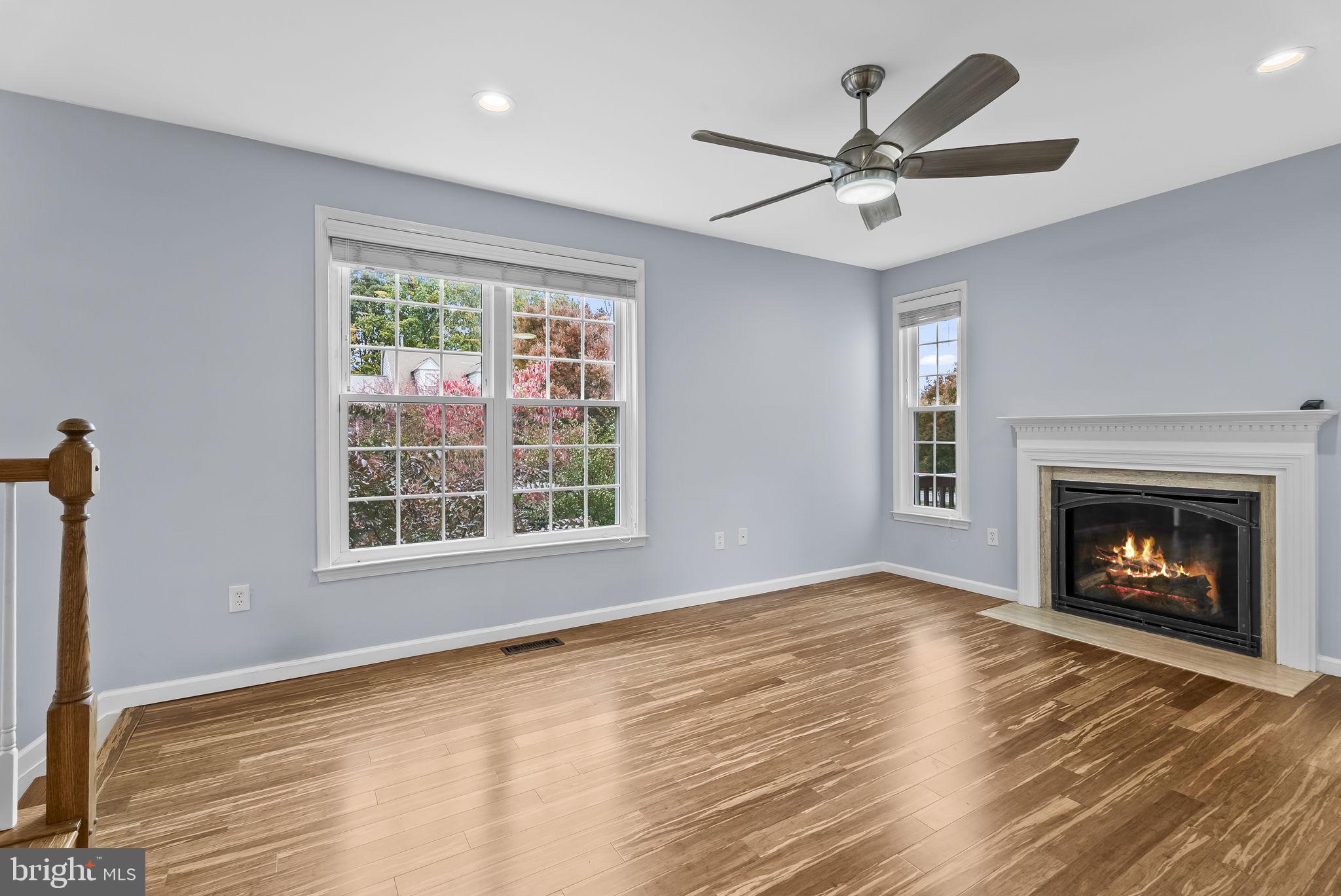 6267 Taliaferro Way Alexandria, VA 22315 - Photo 12 of 49 a view of an empty room with a window and fireplace