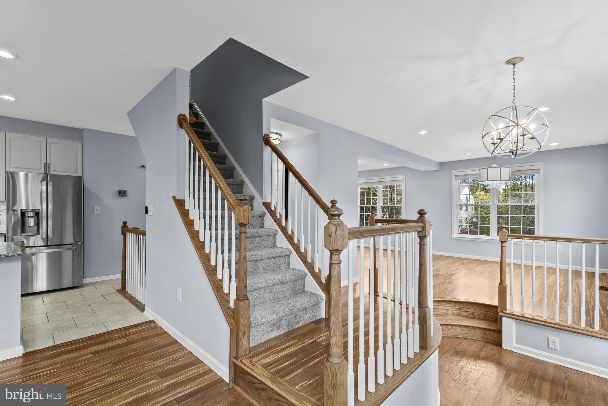 6267 Taliaferro Way Alexandria, VA 22315 - Photo 17 of 49 a view of entryway and hall with wooden floor
