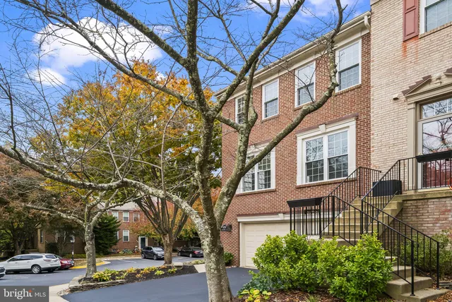 a view of a building with a yard