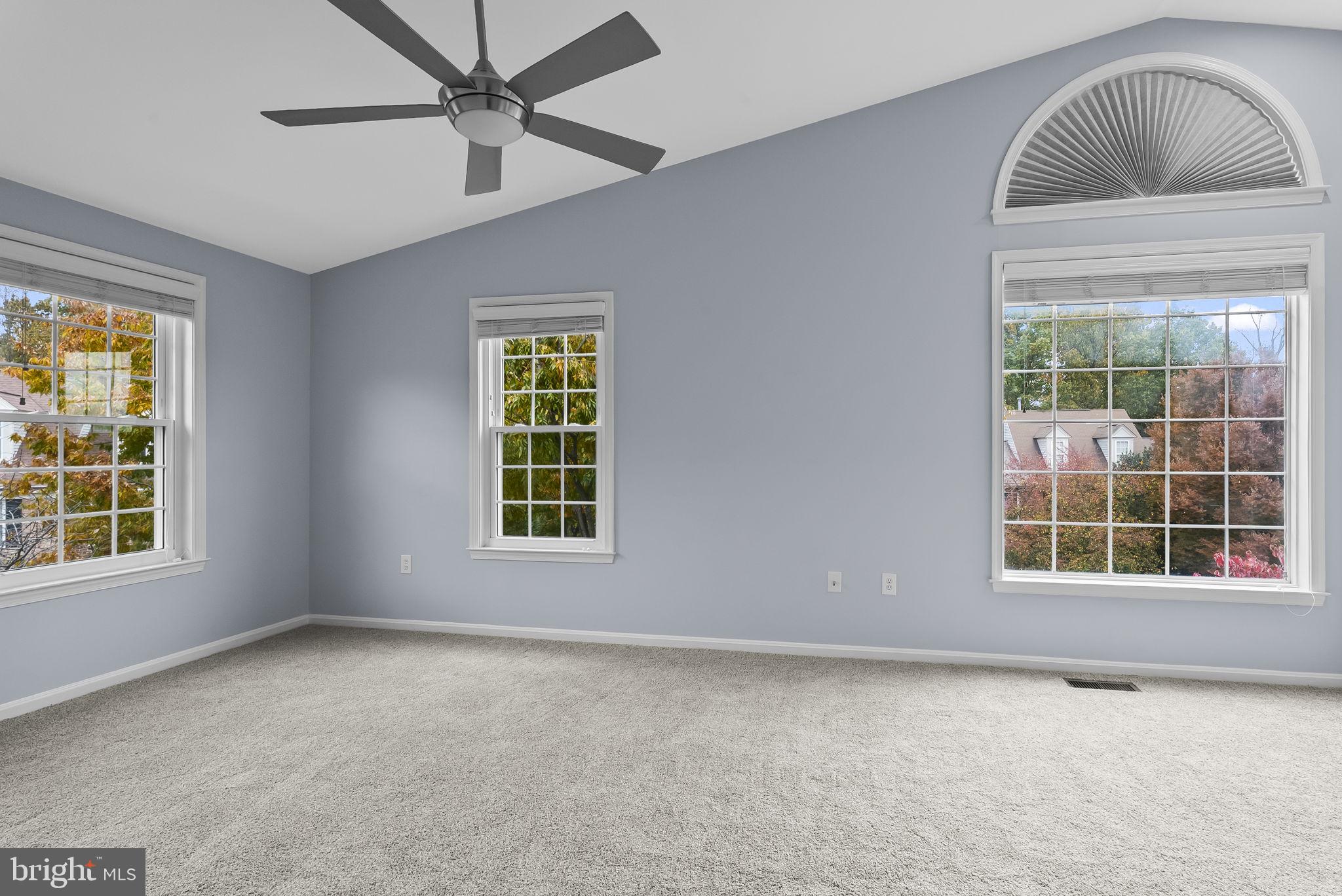 6267 Taliaferro Way Alexandria, VA 22315 - Photo 21 of 49 an empty room with windows and closet