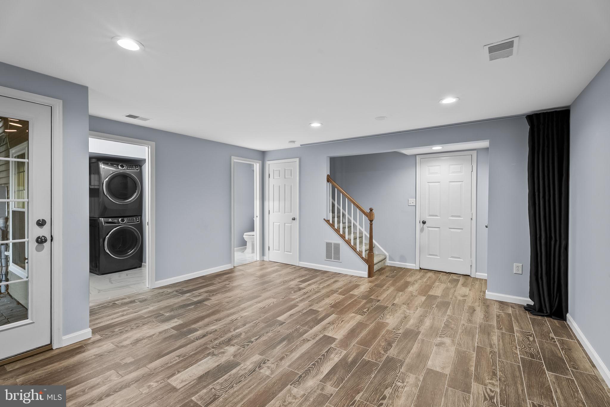 6267 Taliaferro Way Alexandria, VA 22315 - Photo 31 of 49 a view of an empty room with a window