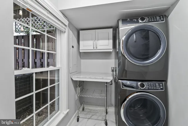 a view of washer and dryer in a utility room