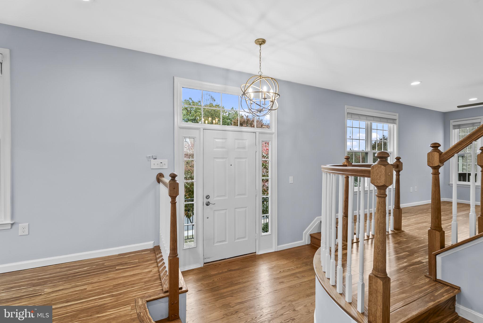 6267 Taliaferro Way Alexandria, VA 22315 - Photo 6 of 49 a view of entryway with wooden floor