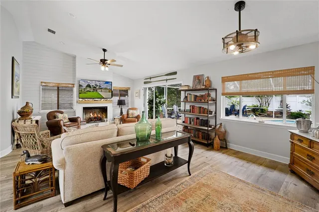 a living room with furniture and a window