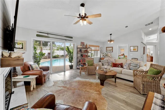 a living room with furniture or outdoor view and a large window