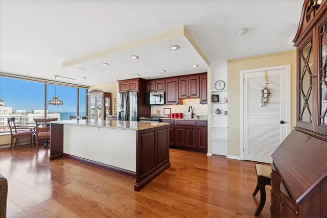 a kitchen with a table and chairs in it