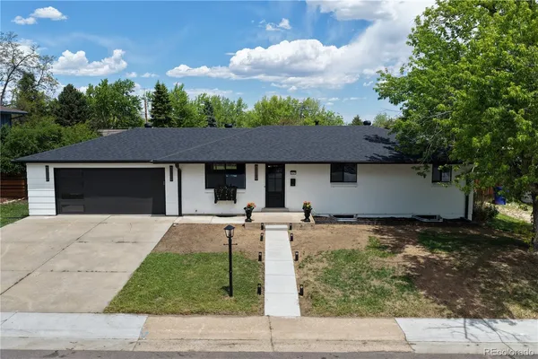 front view of a house with yard