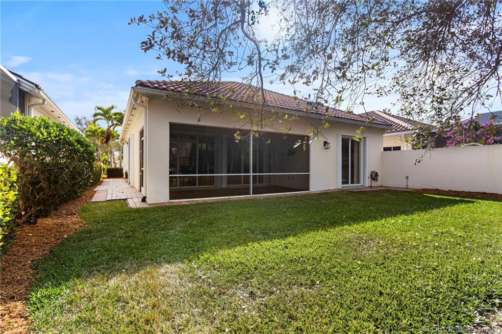 9012 Southeast Eldorado Way Hobe Sound, FL 33455 - Photo 21 of 25 Yard between home and preserve