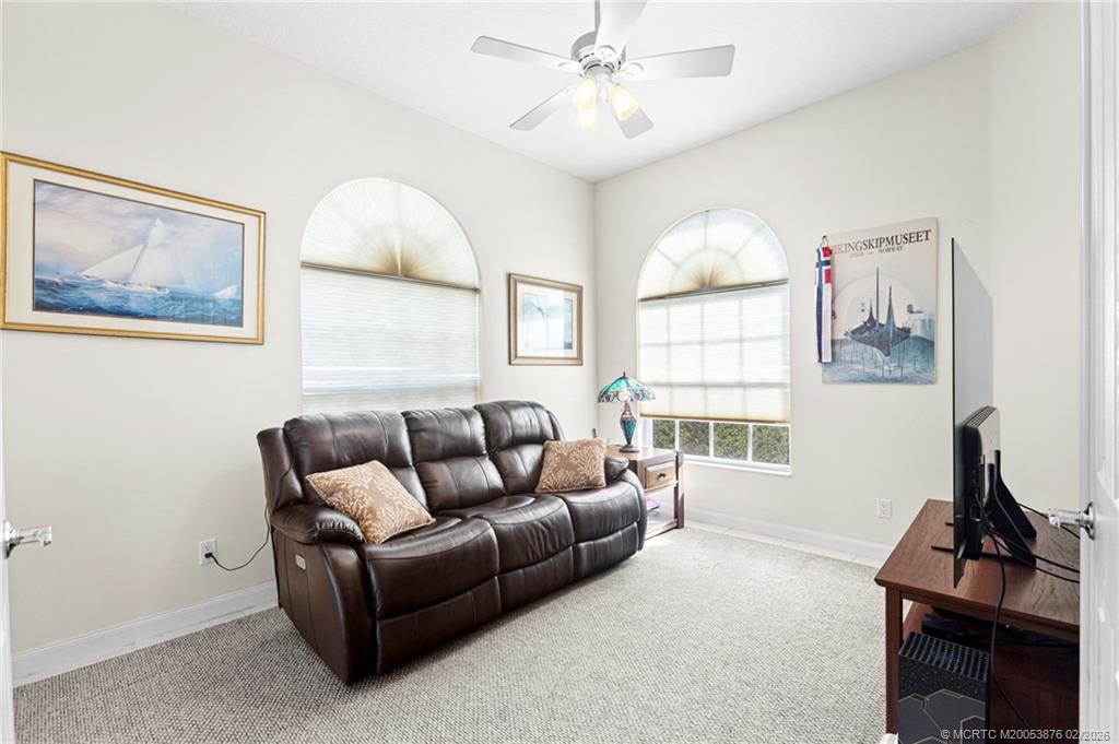 9012 Southeast Eldorado Way Hobe Sound, FL 33455 - Photo 5 of 25 Den in front of the home
