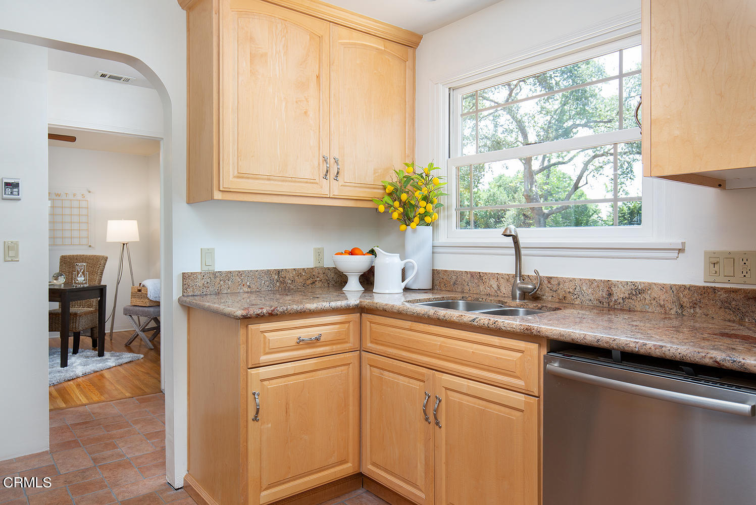 2766 Millicent Way Pasadena, CA 91107 - Photo 10 of 20 a kitchen with granite countertop stainless steel appliances a sink window and cabinets