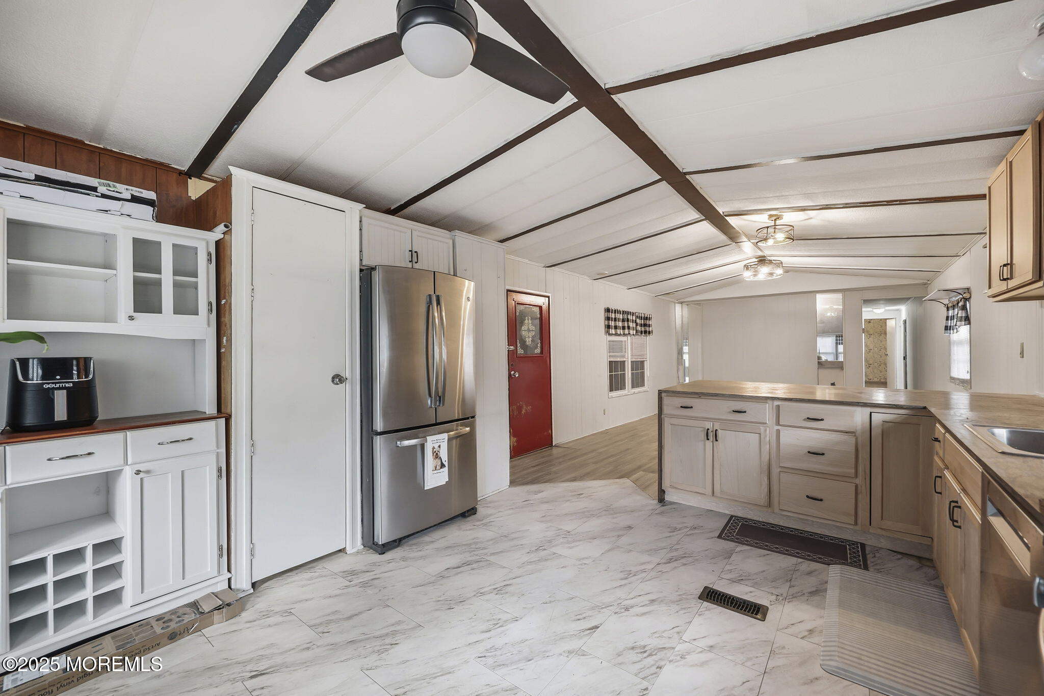 6 Taft Street Howell, NJ 07731 - Photo 13 of 22 a large kitchen with cabinets and stainless steel appliances