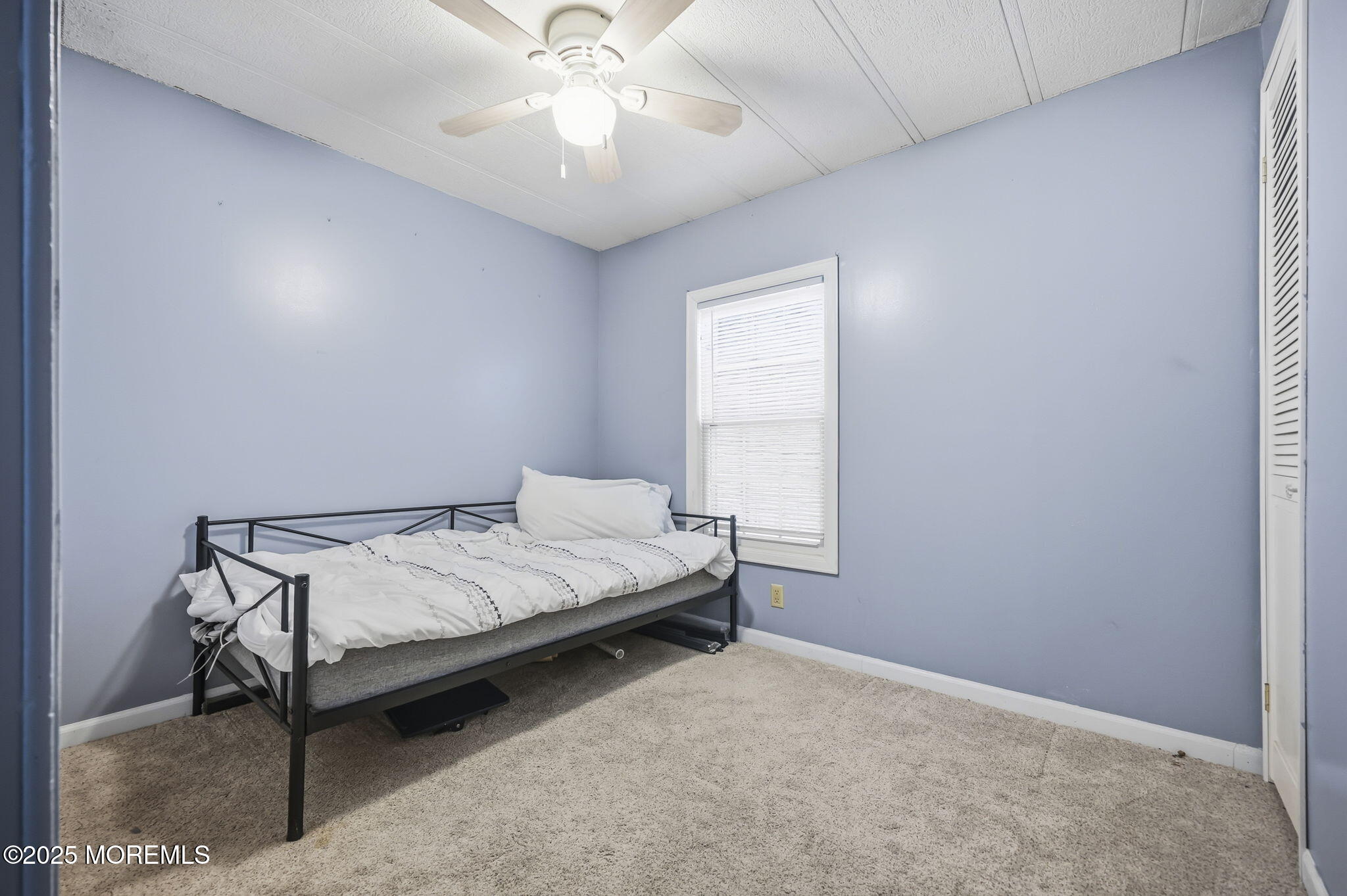 6 Taft Street Howell, NJ 07731 - Photo 14 of 22 a bedroom with a bed and a chandelier