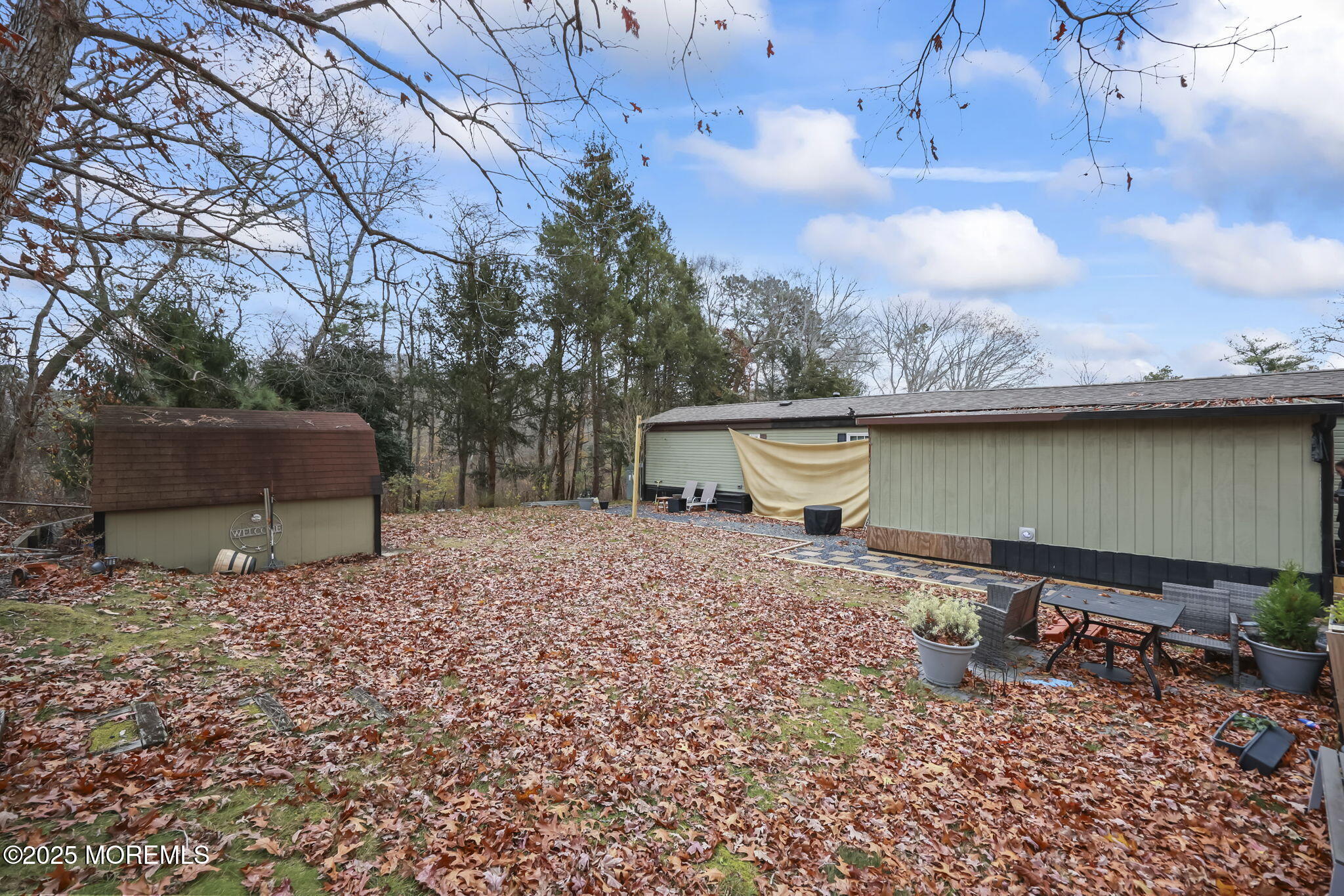 6 Taft Street Howell, NJ 07731 - Photo 20 of 22 a backyard of a house with lots of green space