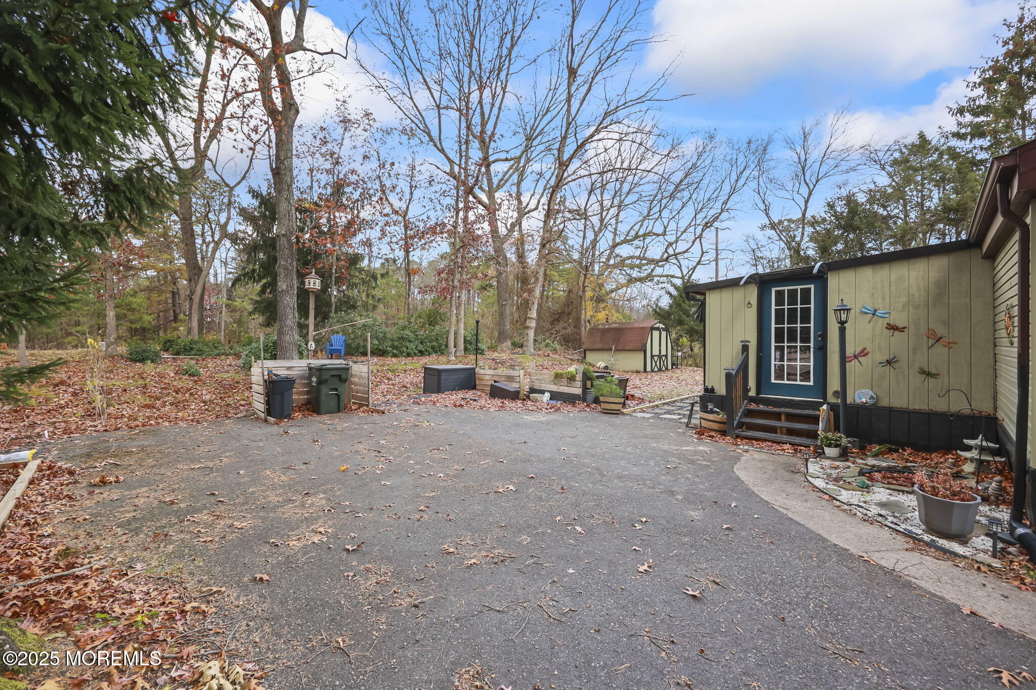 6 Taft Street Howell, NJ 07731 - Photo 5 of 22 a view of a patio with a large tree