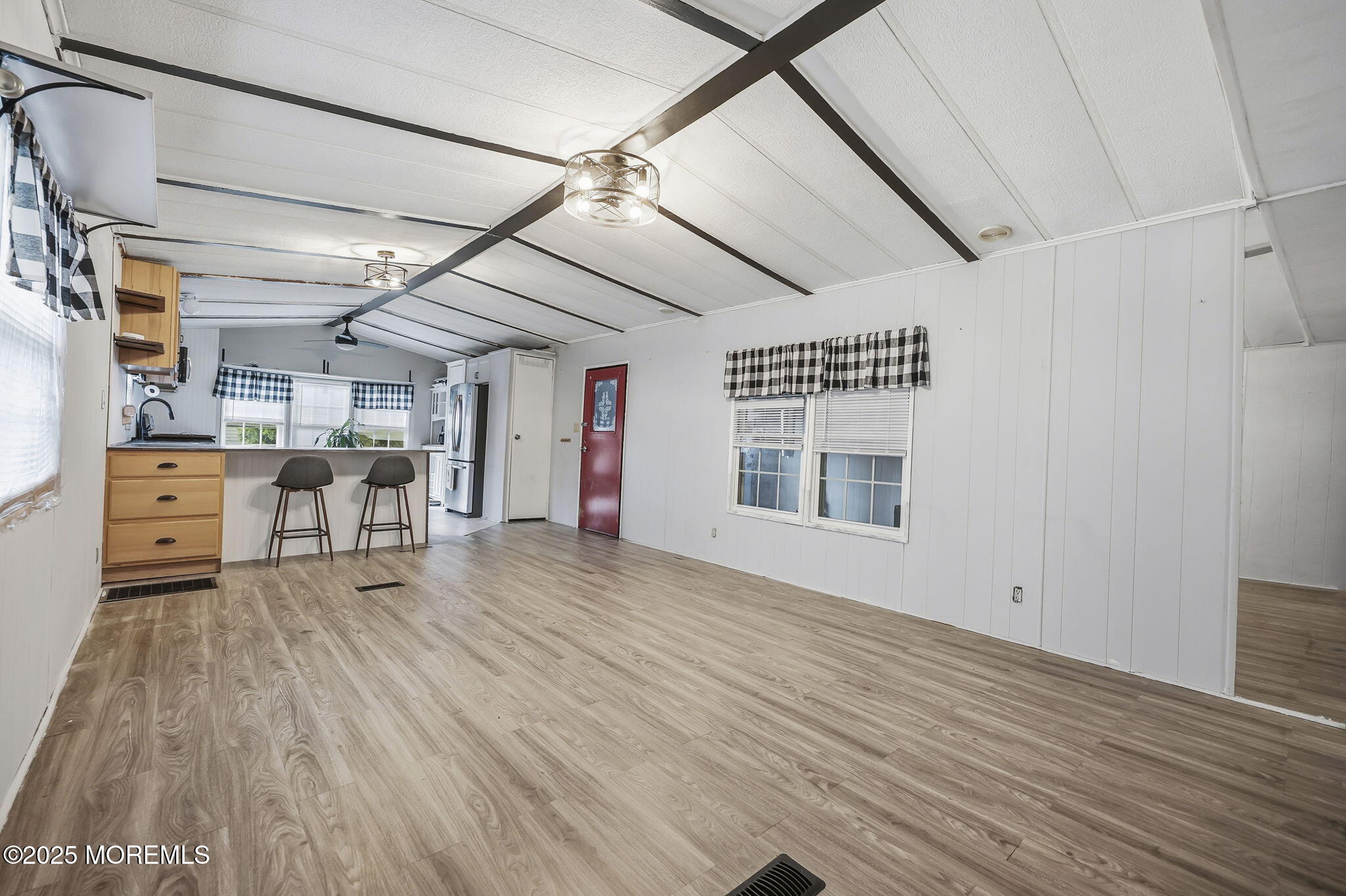 6 Taft Street Howell, NJ 07731 - Photo 9 of 22 a room with lots of wooden furniture and chandelier
