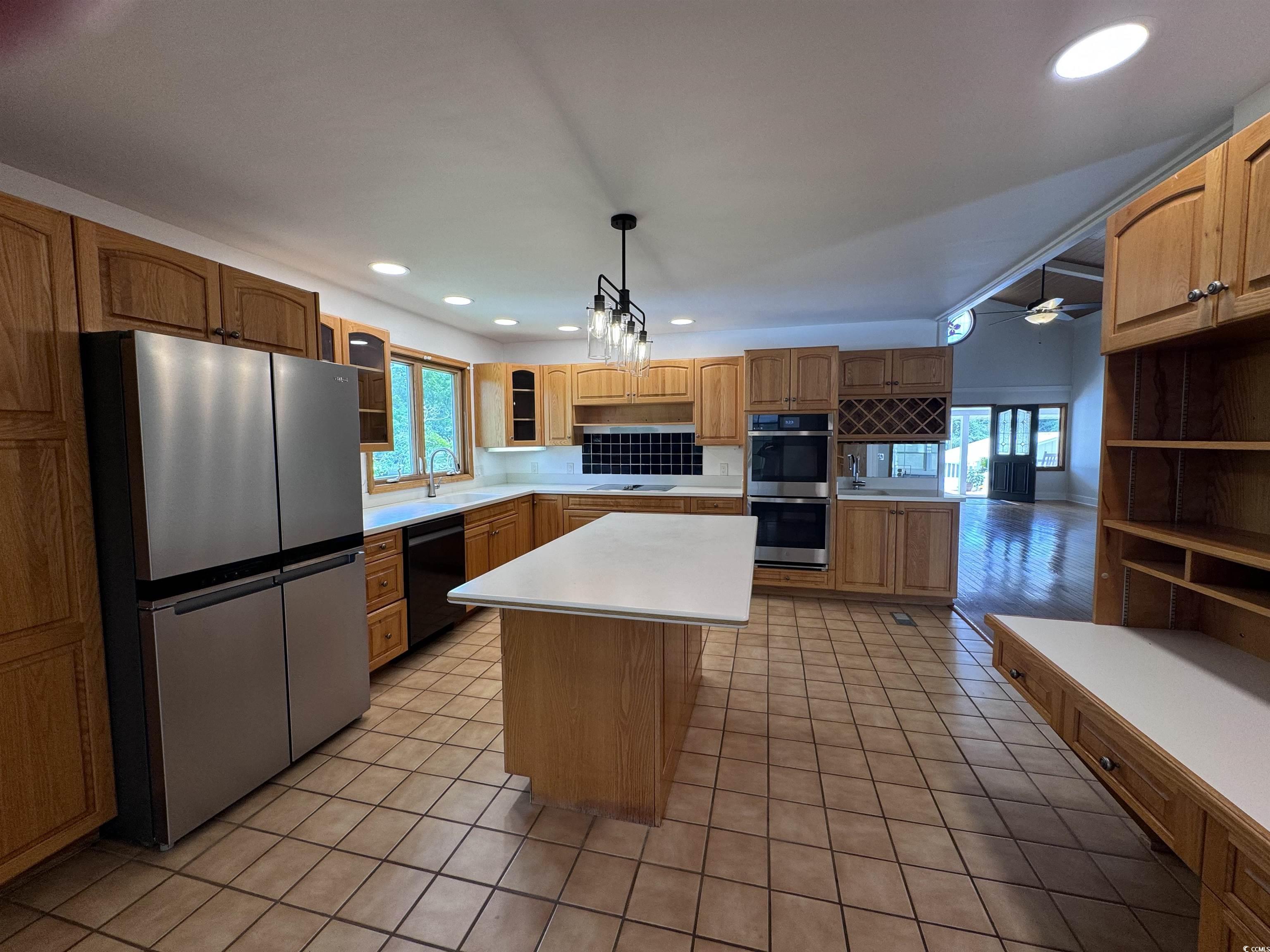 134 Mohican Drive Georgetown, SC 29440 - Photo 7 of 40 Kitchen with appliances with stainless steel finis