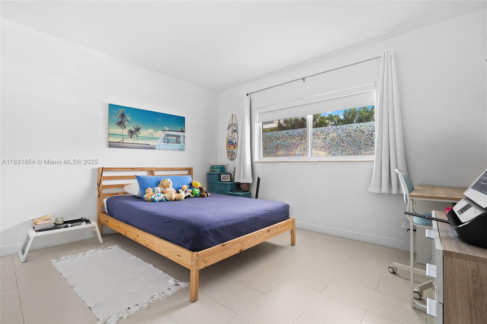 240 Galen Drive, Unit 109 Key Biscayne, FL 33149 - Photo 12 of 30 a bedroom with a bed and a window