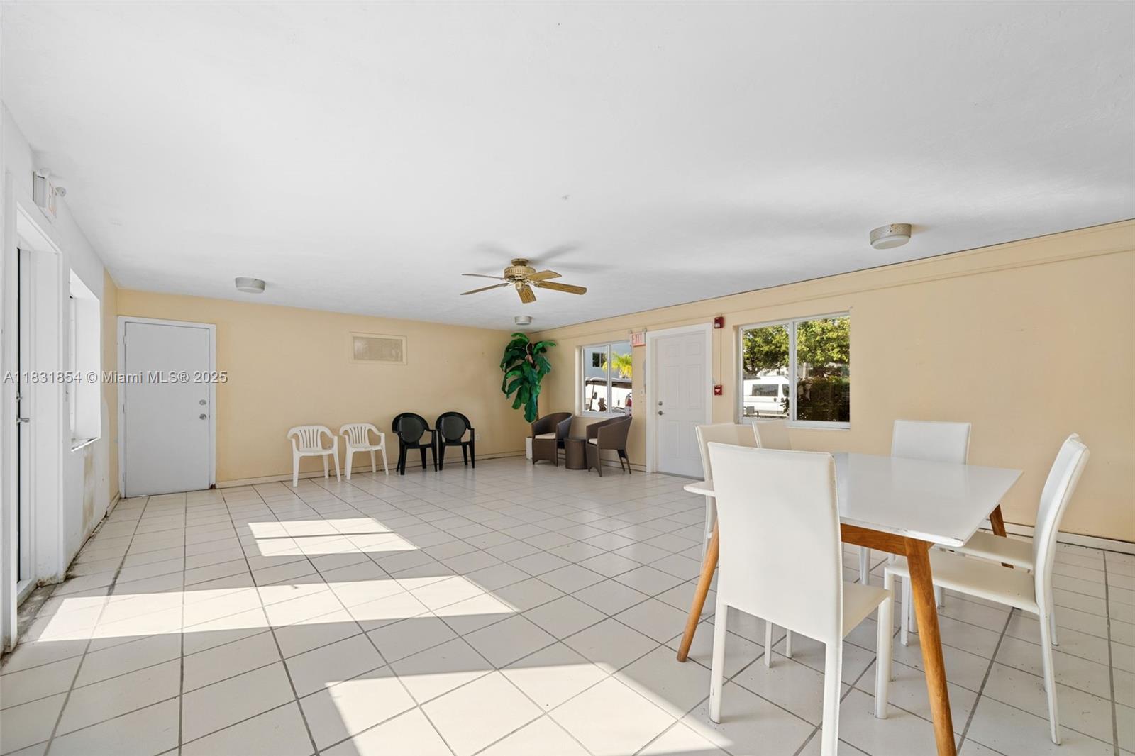 240 Galen Drive, Unit 109 Key Biscayne, FL 33149 - Photo 27 of 30 a view of a livingroom and a dining room with furniture