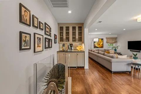 a bedroom with furniture and a fireplace