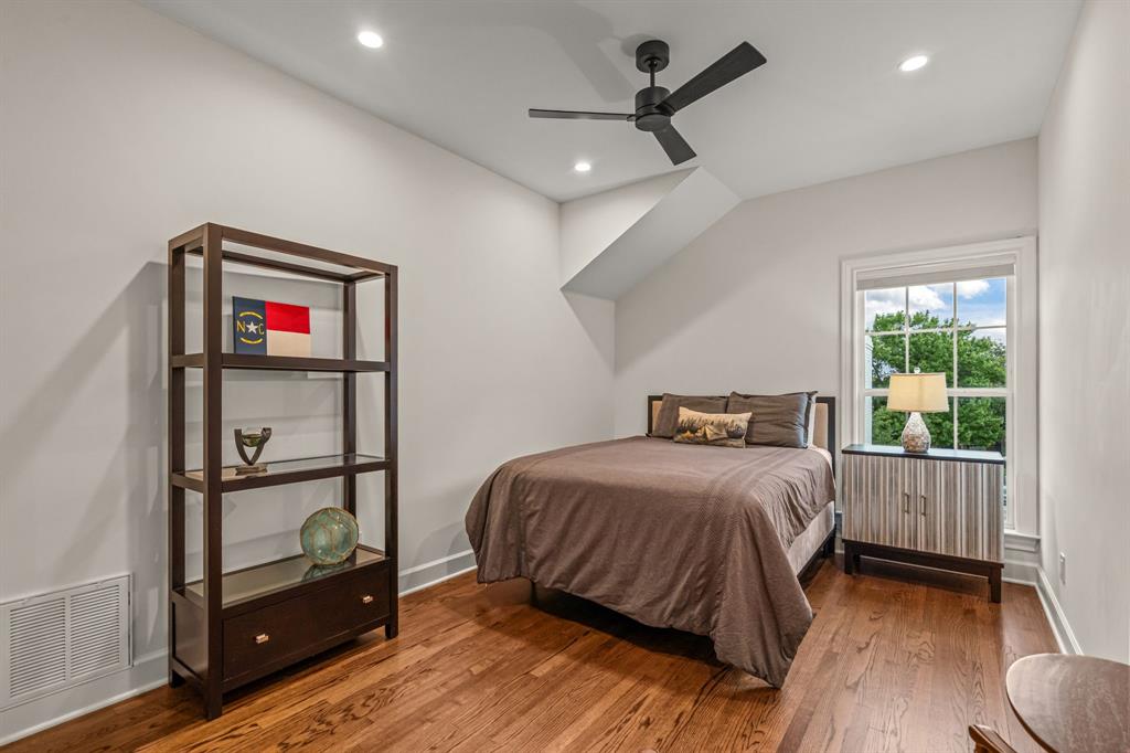 3913 Hamilton Avenue Fort Worth, TX 76107 - Photo 29 of 40 a bedroom with a bed and a window