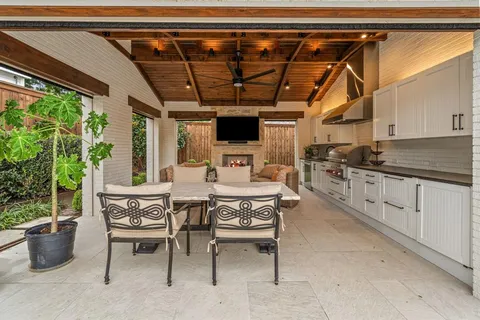 a view of swimming pool with outdoor seating