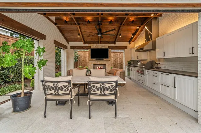 a view of swimming pool with outdoor seating