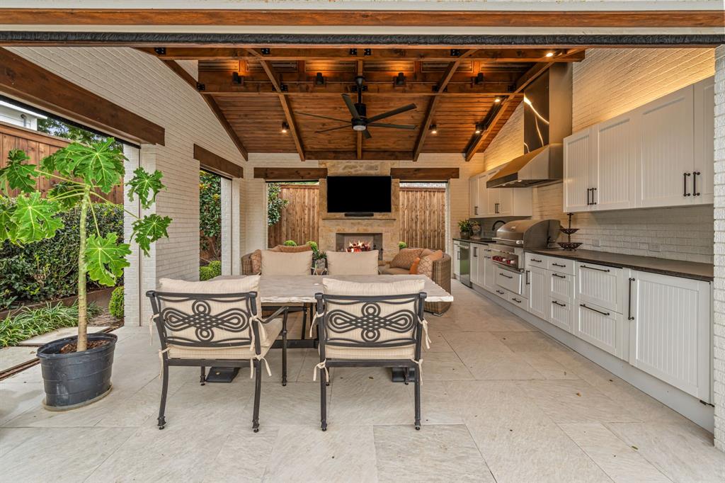 3913 Hamilton Avenue Fort Worth, TX 76107 - Photo 34 of 40 a view of a kitchen with a table and chairs