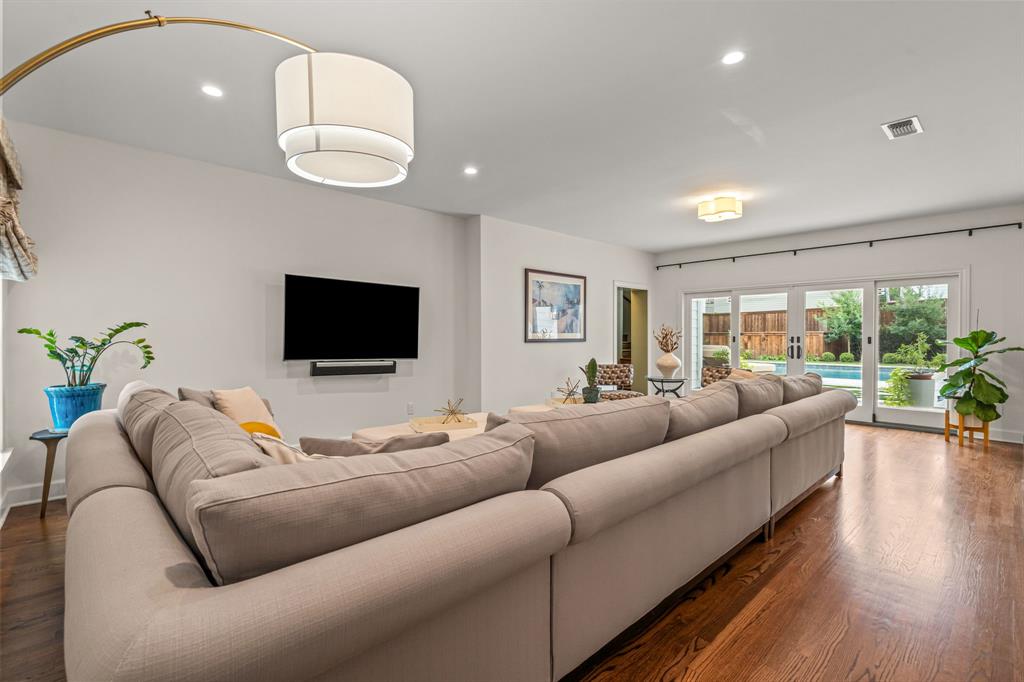 3913 Hamilton Avenue Fort Worth, TX 76107 - Photo 5 of 40 a living room with furniture and a flat screen tv