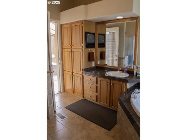 a kitchen with a sink and a stove