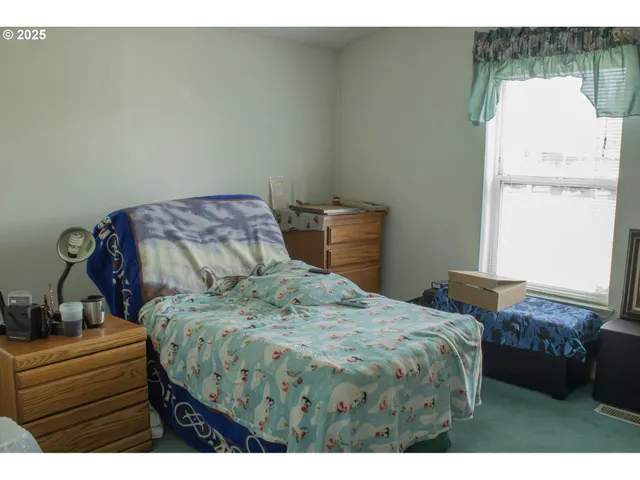 a view of a backyard of the house