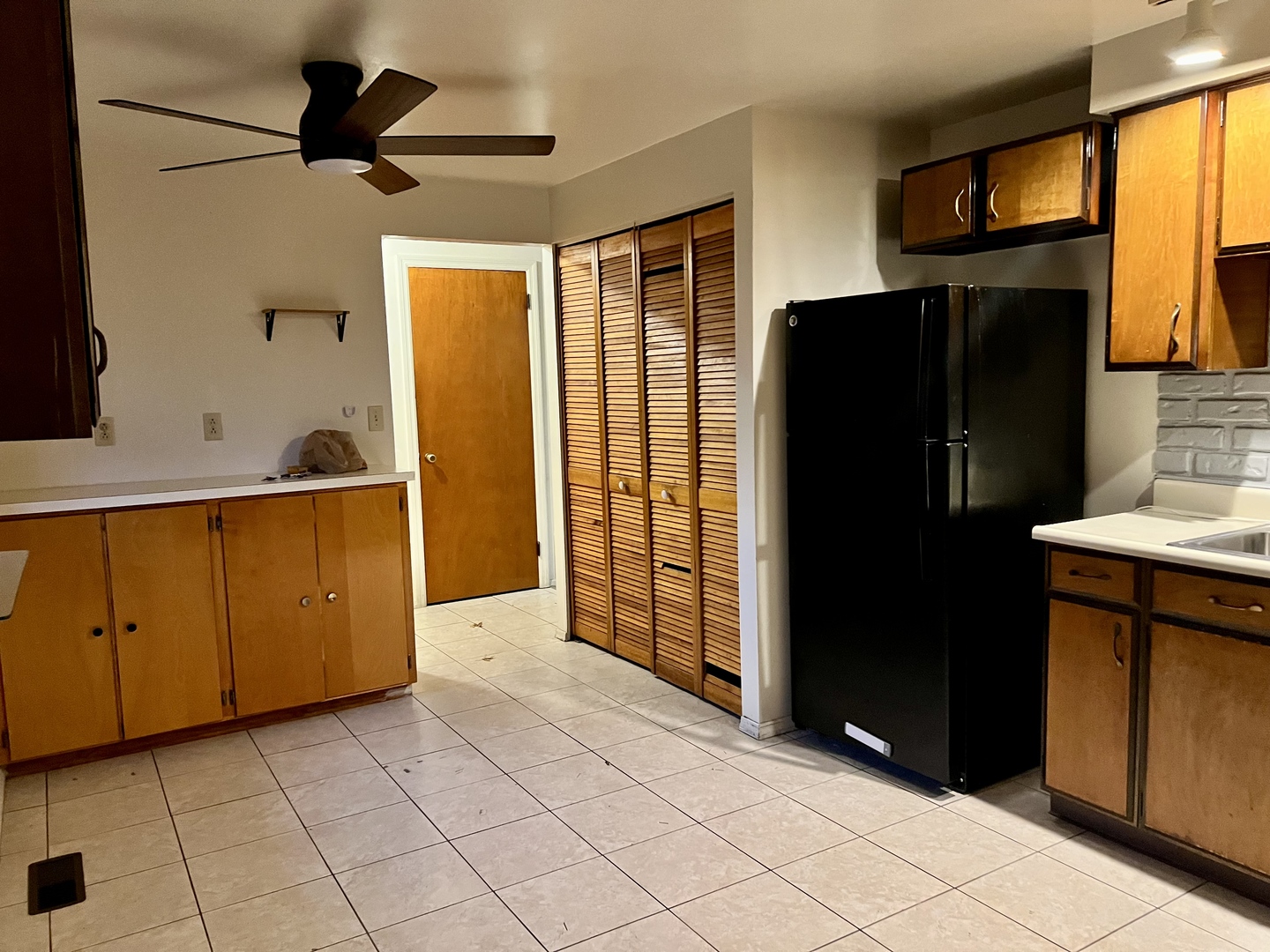 2504 Campbell Drive Champaign, IL 61821 - Photo 13 of 24 a kitchen with stainless steel appliances granite countertop a refrigerator and a stove