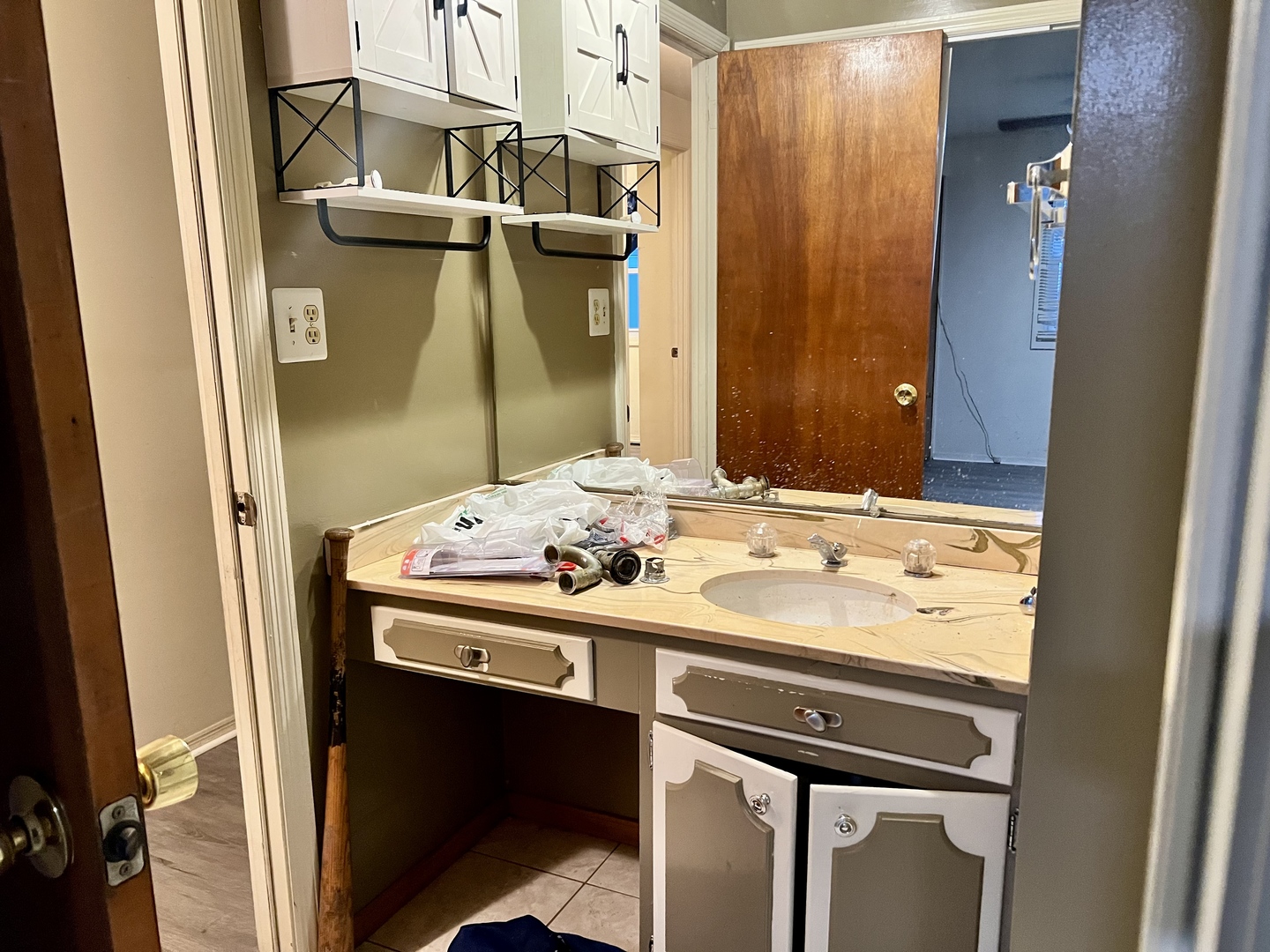 2504 Campbell Drive Champaign, IL 61821 - Photo 20 of 24 a bathroom with a sink and a mirror