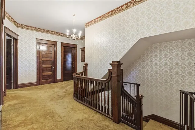 a view of a hallway with windows