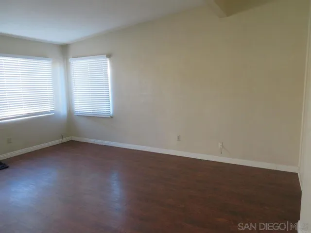 a kitchen with a stove and a refrigerator