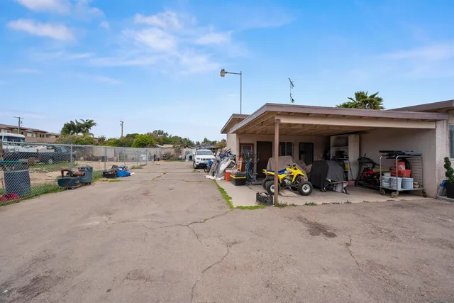 a view of a car parked on the side of the road