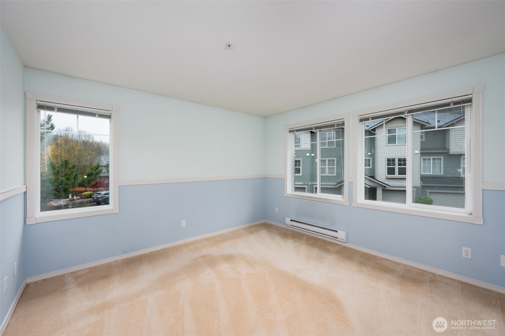 15325 Southeast 155th Place, Unit X4 Renton, WA 98058 - Photo 13 of 23 a view of an empty room with a window