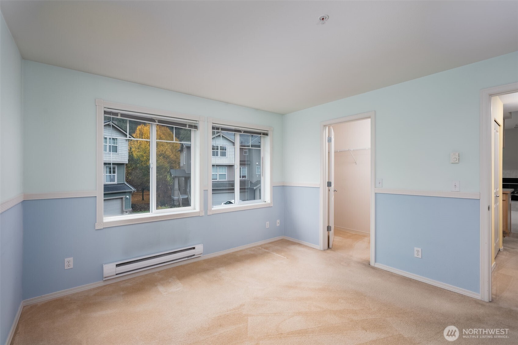 15325 Southeast 155th Place, Unit X4 Renton, WA 98058 - Photo 15 of 23 an empty room with windows