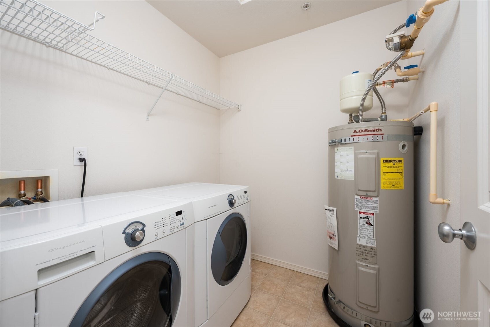 15325 Southeast 155th Place, Unit X4 Renton, WA 98058 - Photo 19 of 23 a utility room with dryer and washer