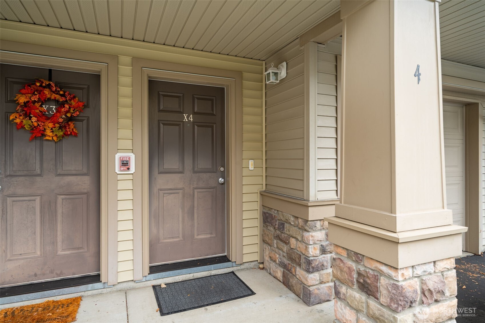 15325 Southeast 155th Place, Unit X4 Renton, WA 98058 - Photo 4 of 23 a view of front door of house