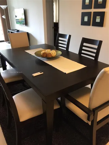 a terrace with table and chairs