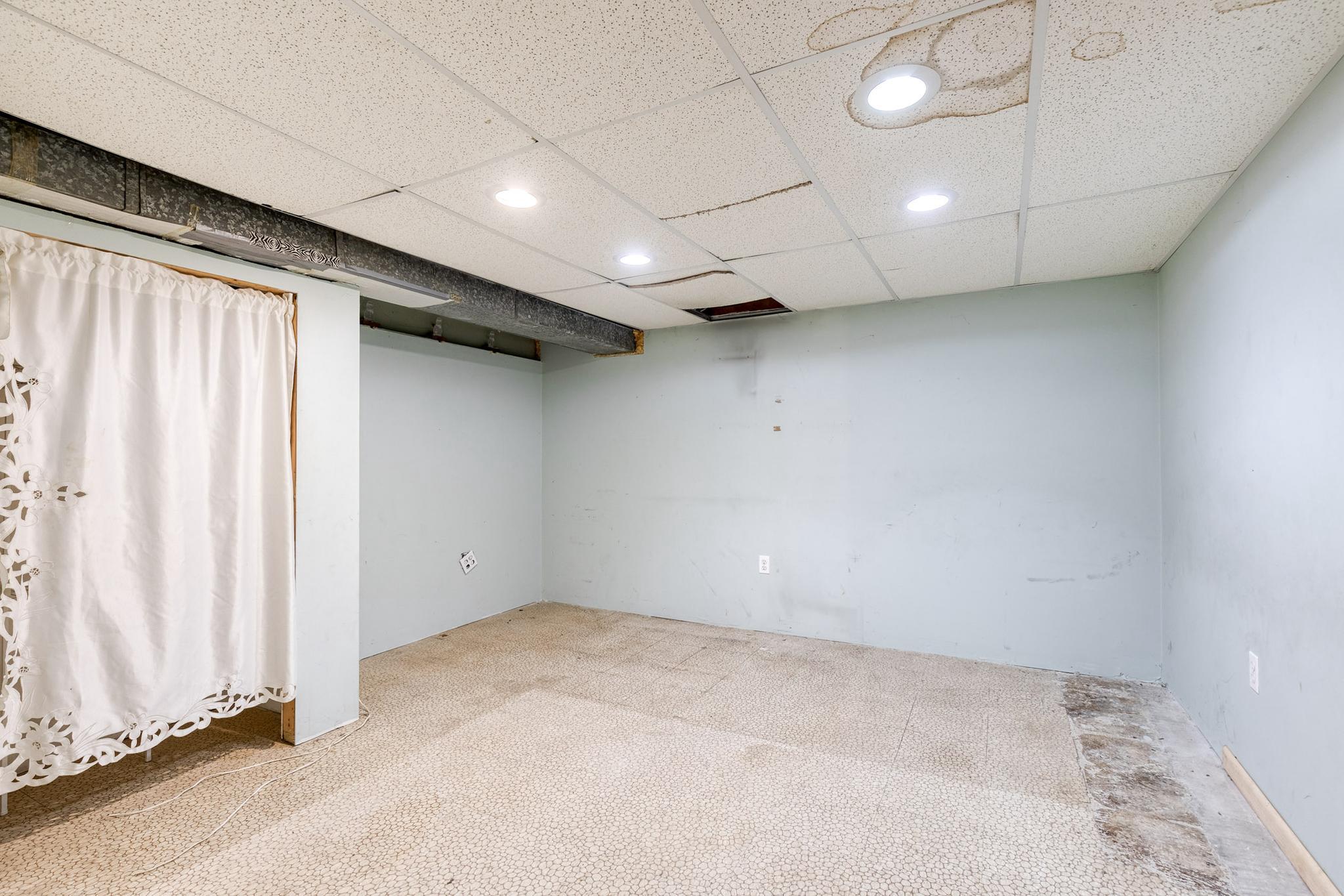 8306 Berkfield Road Baltimore, MD 21237 - Photo 18 of 26 Basement bedroom/ family room/ office