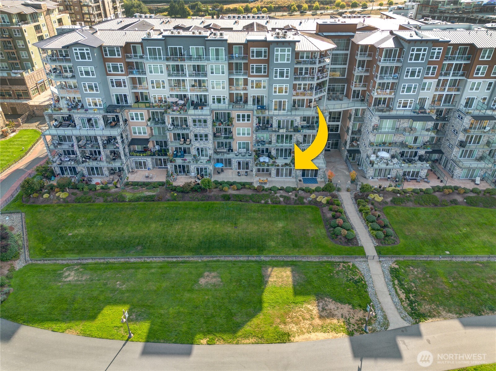 5105 Grand Loop, Unit 105 Tacoma, WA 98407 - Photo 2 of 39 a aerial view of a building