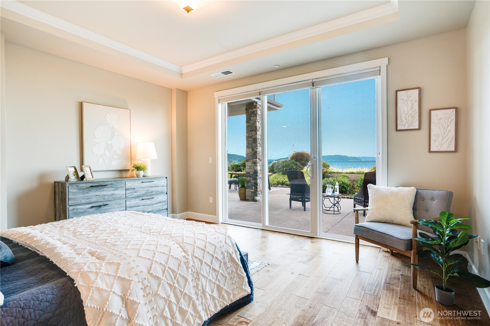5105 Grand Loop, Unit 105 Tacoma, WA 98407 - Photo 21 of 39 a bed room with a bed and a chair