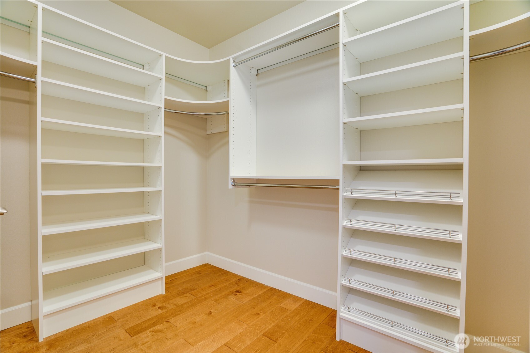 5105 Grand Loop, Unit 105 Tacoma, WA 98407 - Photo 24 of 39 a view of walk in closet with empty racks
