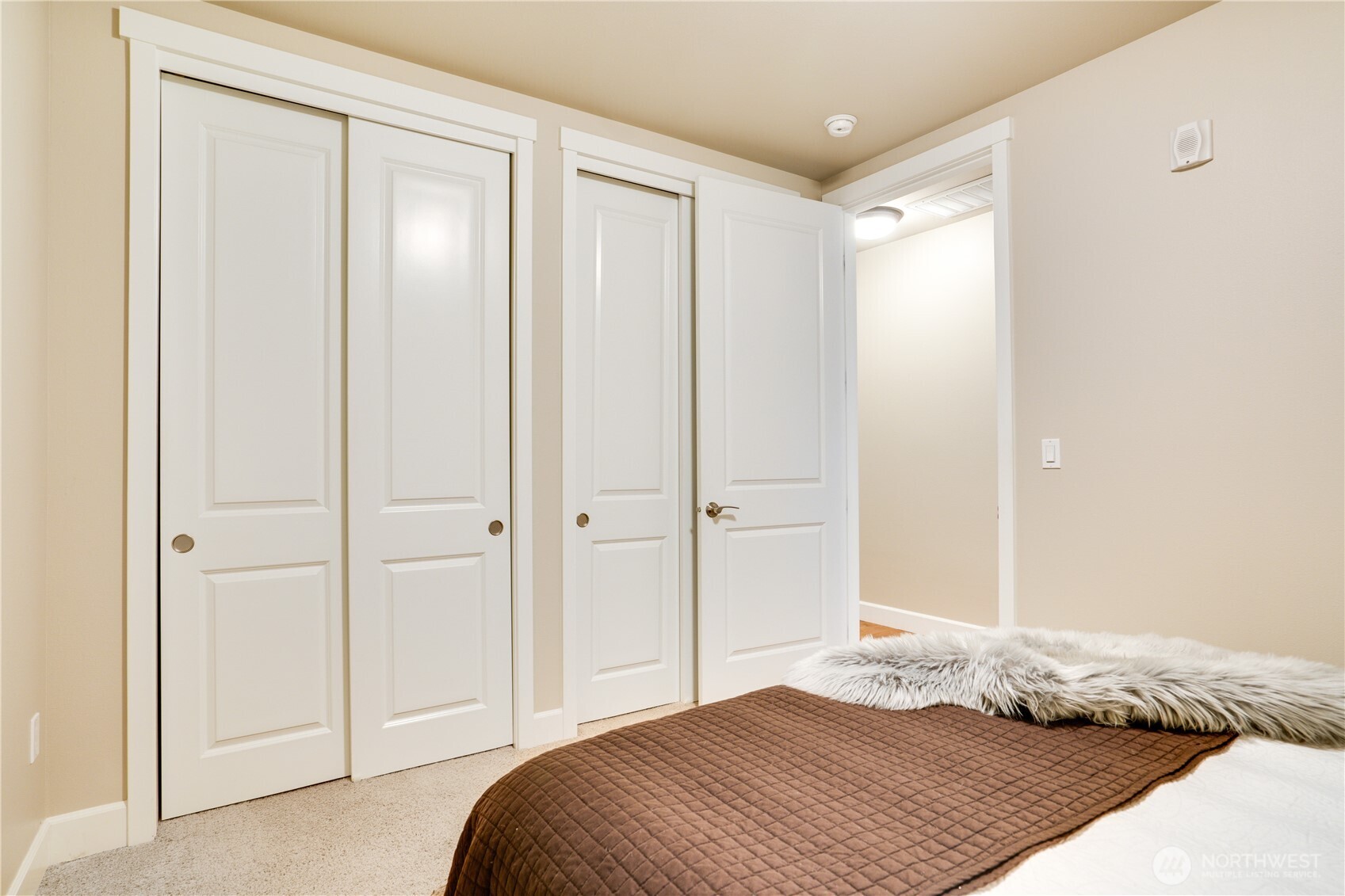 5105 Grand Loop, Unit 105 Tacoma, WA 98407 - Photo 26 of 39 a bedroom with a bed and a shower