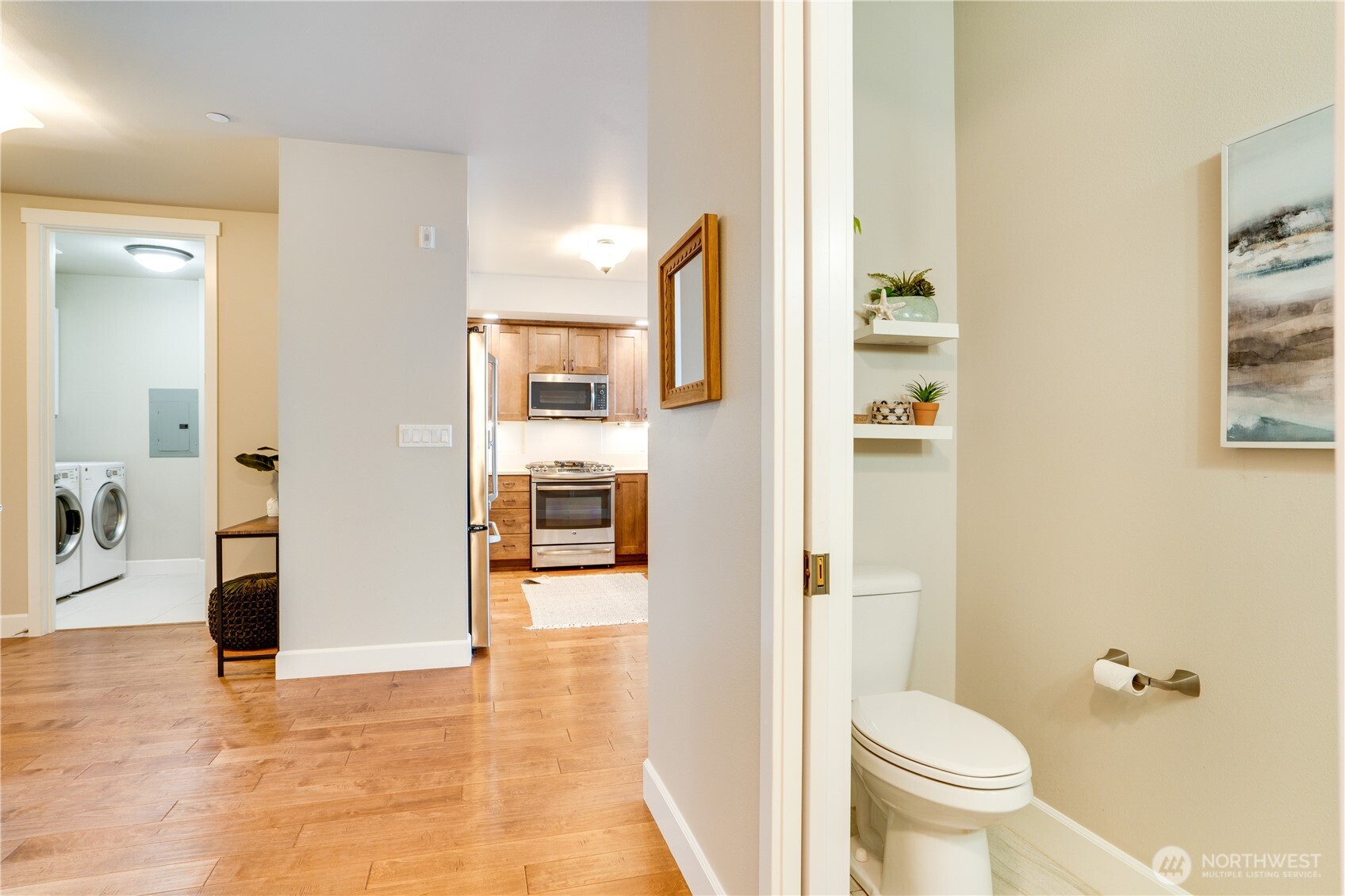 5105 Grand Loop, Unit 105 Tacoma, WA 98407 - Photo 33 of 39 a bathroom with a toilet sink and shower