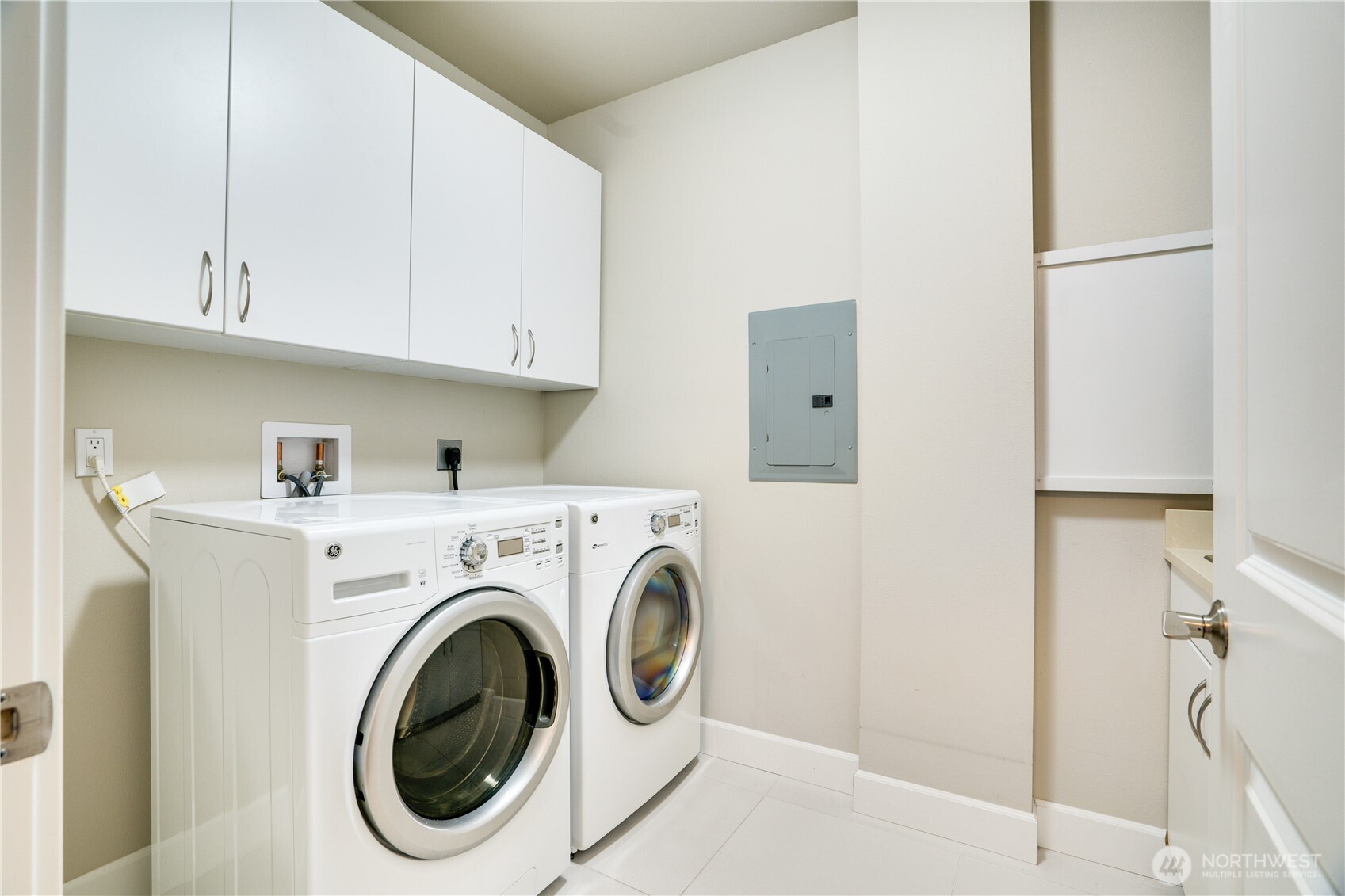 5105 Grand Loop, Unit 105 Tacoma, WA 98407 - Photo 34 of 39 a utility room with dryer and washer