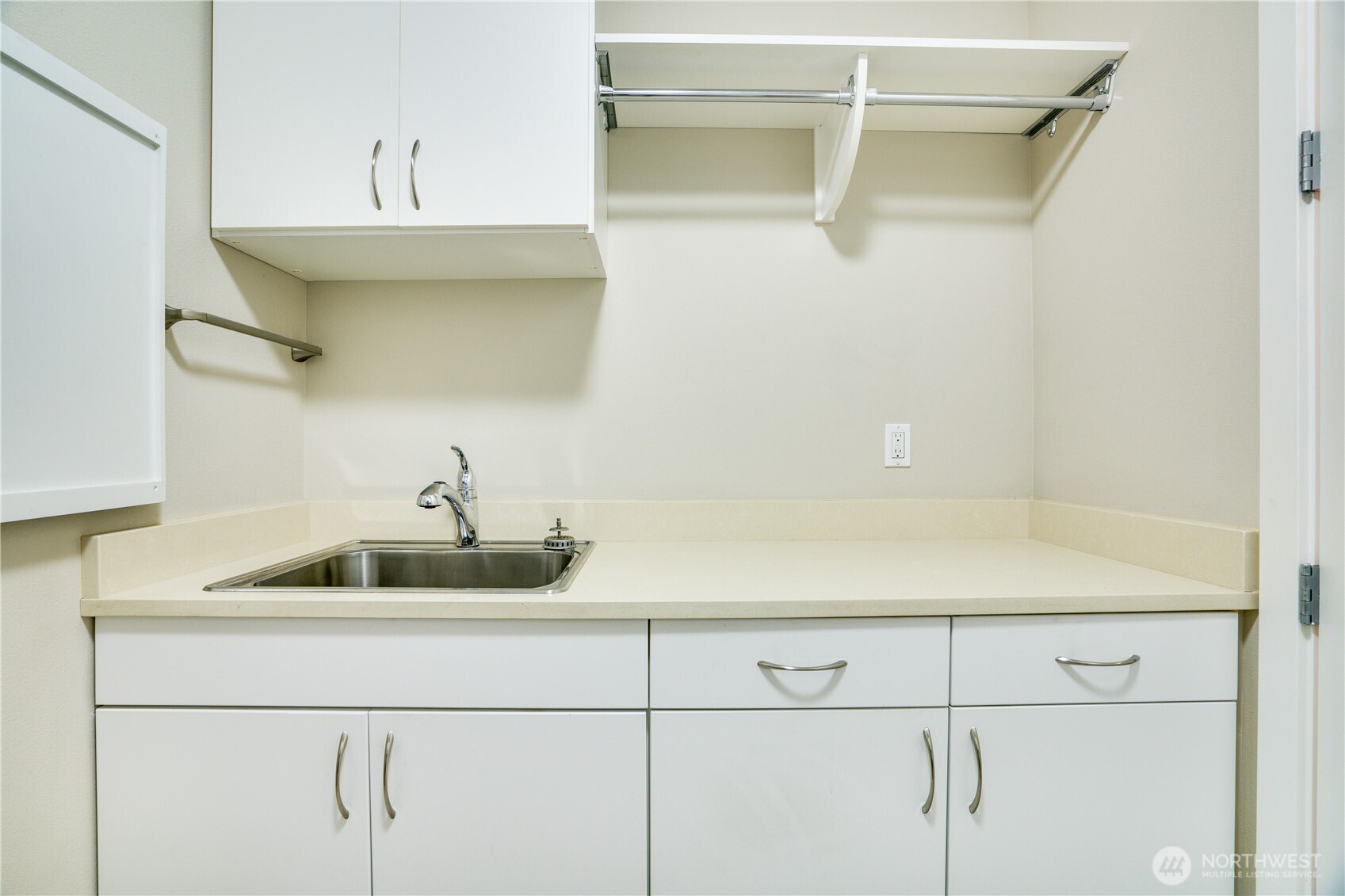 5105 Grand Loop, Unit 105 Tacoma, WA 98407 - Photo 35 of 39 a kitchen with a sink and cabinets