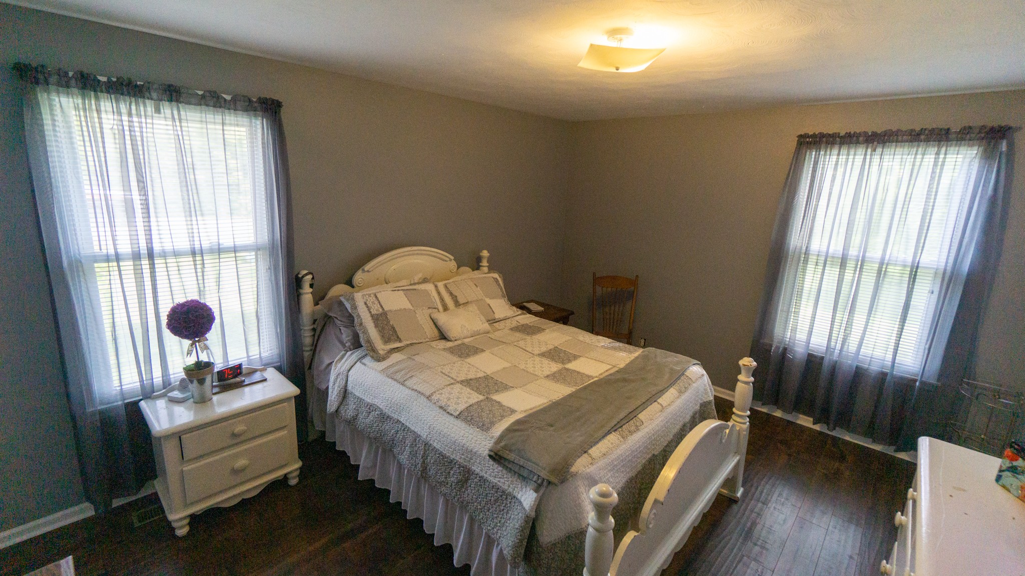 424 Dorris Road Portland, TN 37148 - Photo 11 of 48 a bedroom with a bed and wooden floor